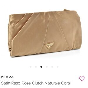 Like New Authentic Prada satin clutch with pink and purple roses.